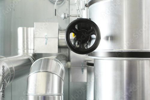 chrome pipes in heating and AC rooms in buildings of factories and hospital