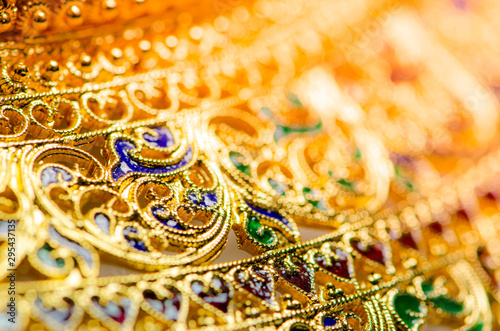 Gold jewelry on white background, Gold jewelry Sukhothai style from Thailand,Prima Gold,select focus.