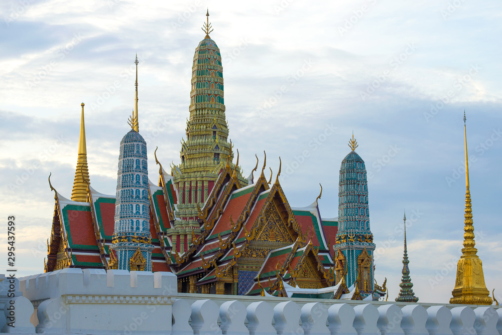 Naklejka premium Fragment of the old Grand Royal Palace on evening twilight. Bangkok, Thailand