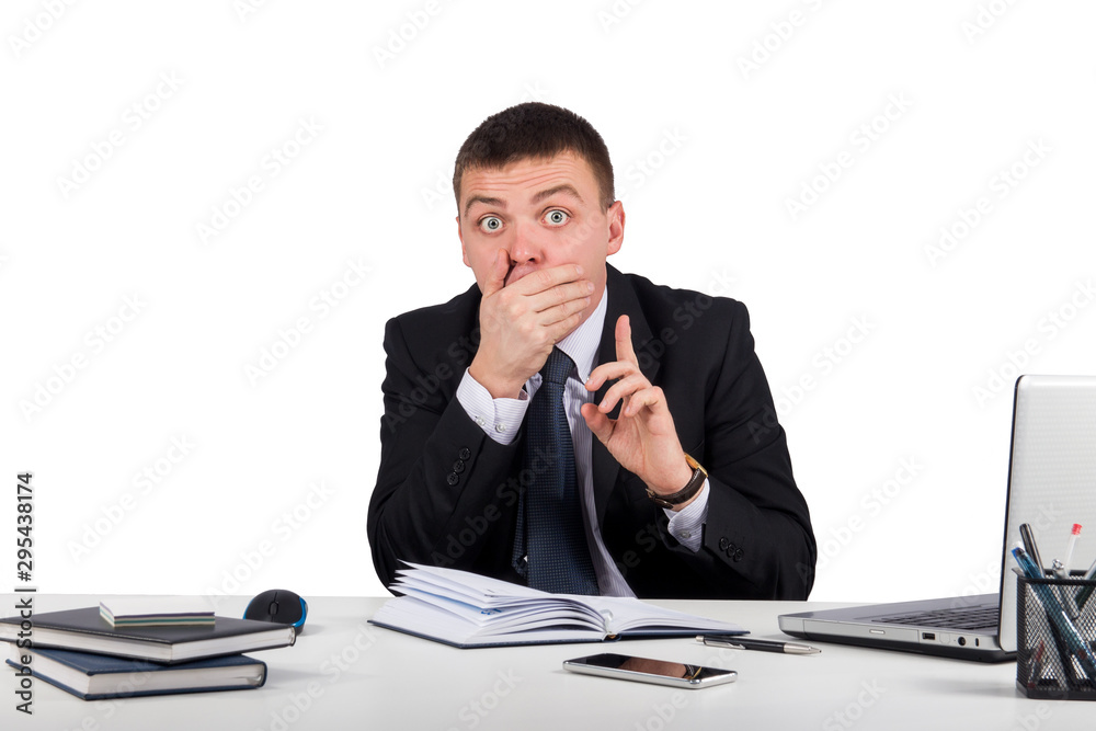 Office, finances, internet, business, success and people concept-Businessman with smartphone holding his finger in front of his mouth and making silence gesture shh