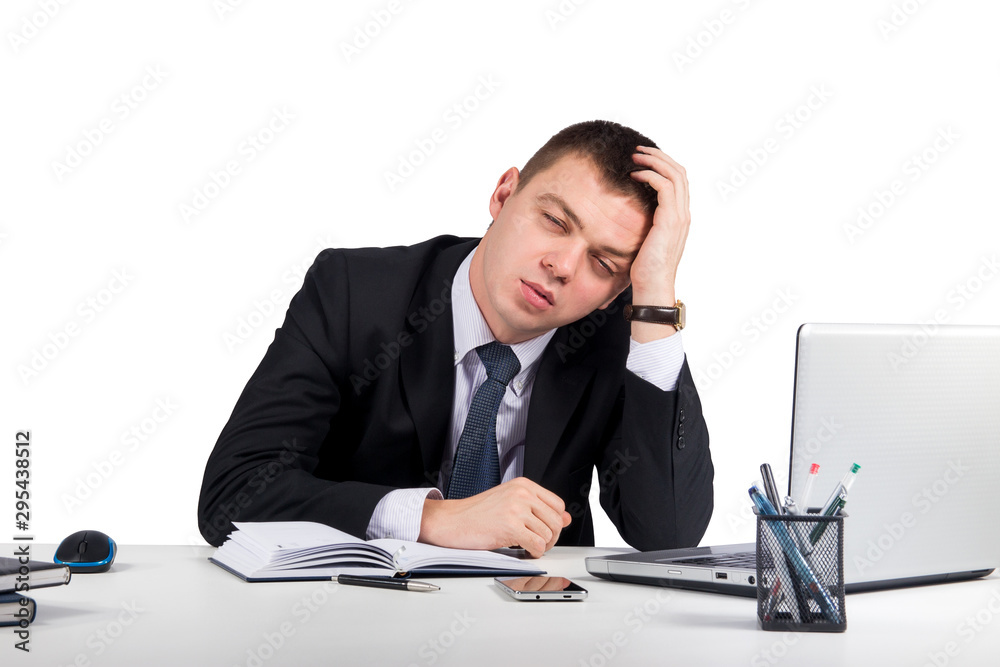 Office, finances, internet, business, success and stress concept-Frustrated young businessman working on laptop computer at office Office, finances, internet, business, success and stress concept-Frustrated young businessman working on laptop computer at office