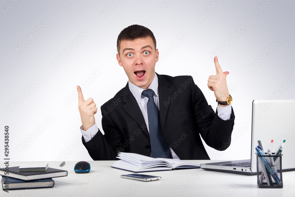 Office, finances, internet, business, success and stress concept-Portrait of happy businessman showing thumbs up Office, finances, internet, business, success and stress concept-Portrait of happy businessman showing thumbs up