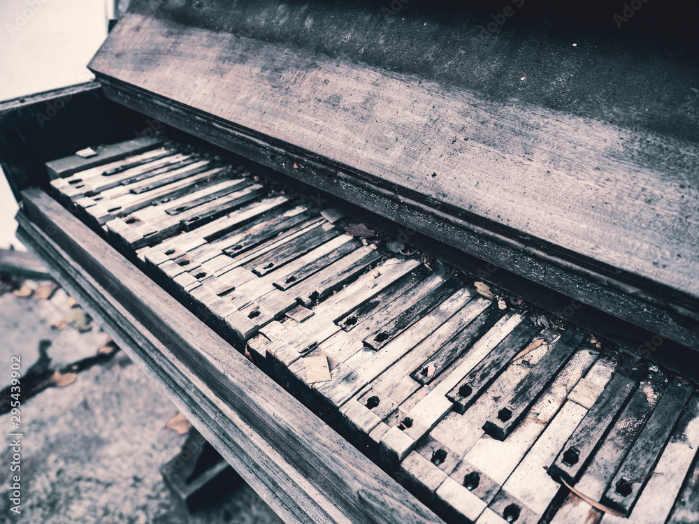 Old broken piano in ruins. Old broken piano in ruins.