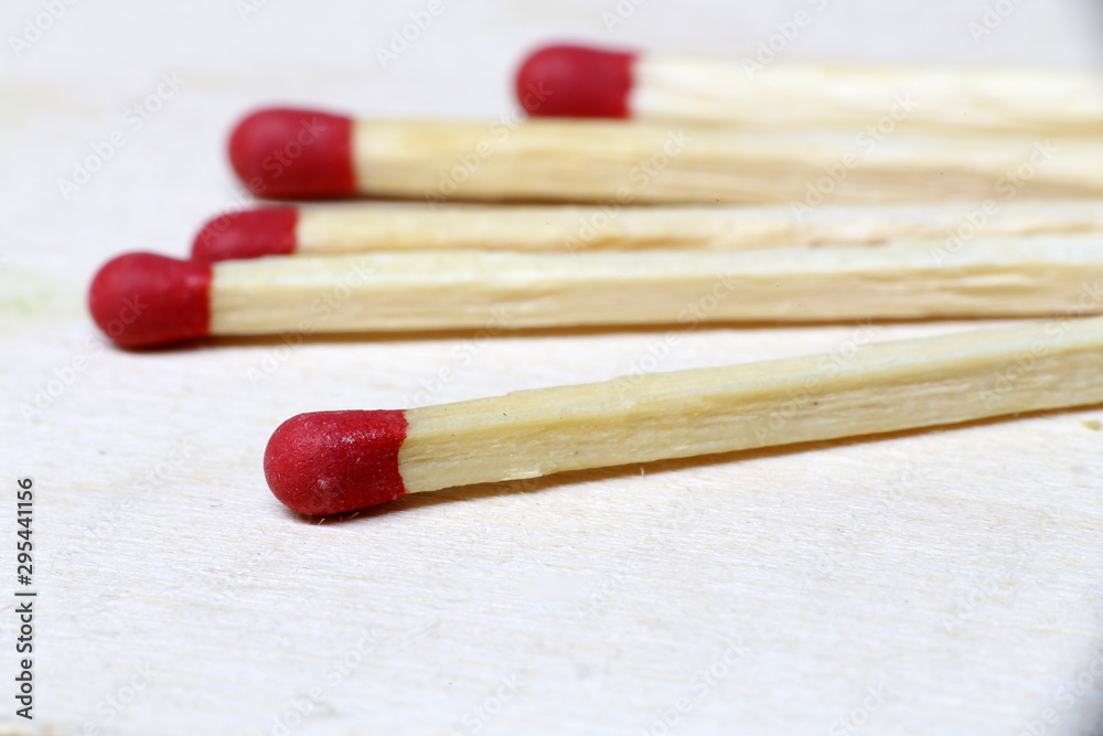 Symbol of danger with matches on white background top view Symbol of danger with matches on white background top view