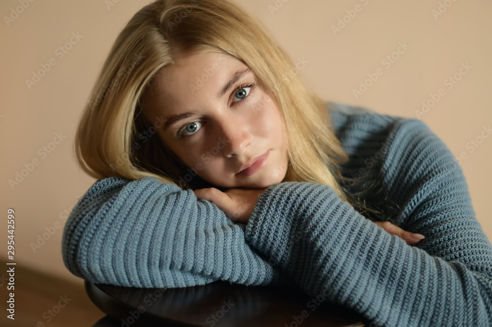 Portrait of beautiful sensual woman with blue eyes. Studio shot. Portrait of beautiful sensual woman with blue eyes. Studio shot.