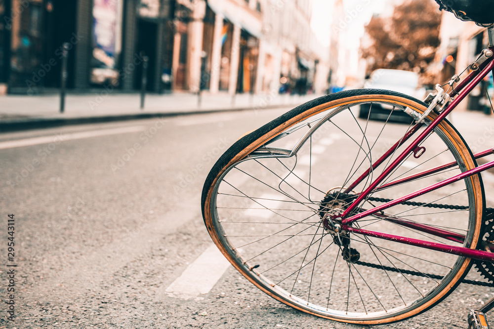 Damaged bicycle with a bent wheel during a road accident collision Damaged bicycle with a bent wheel during a road accident collision