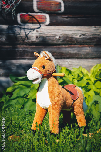 Children's toy rocking horse with a white mane .Texture or background