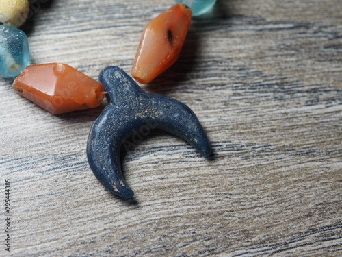 Ancient glass beads with carnelian