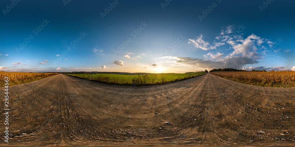 full seamless spherical hdri panorama 360 degrees angle view on gravel road among fields in summer evening sunset with awesome clouds in equirectangular projection, ready for VR AR virtual reality