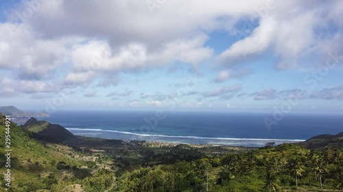 Time lapse of an indonesian beach near some green mountains, in Lombok