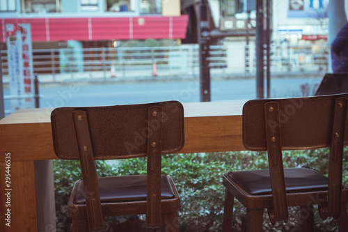 Retro interior cafe corner bar with chairs table window in home office photo