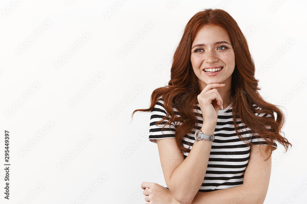 Motivated cheerful and smart redhead female student pondering with team ideas of project, look away, touch chin thoughtful, smiling acceptingly, standing pleased white background thinking Motivated cheerful and smart redhead female student pondering with team ideas of project, look away, touch chin thoughtful, smiling acceptingly, standing pleased white background thinking