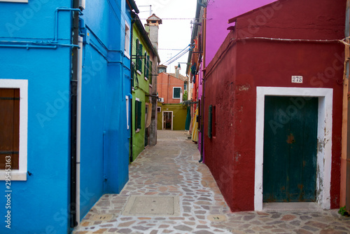 Fototapeta Naklejka Na Ścianę i Meble -  Venice / Italy - September 29th 2019: Colorful streets of Burano, Venice, Italy