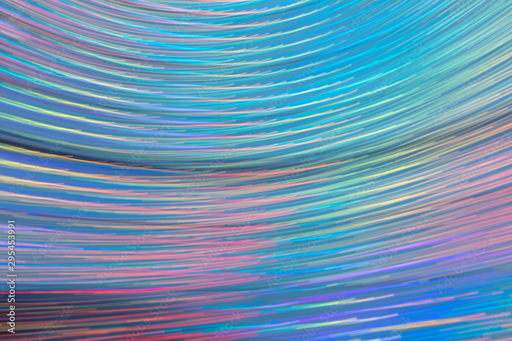 Abstract background of blue and violet light bulbs in motion