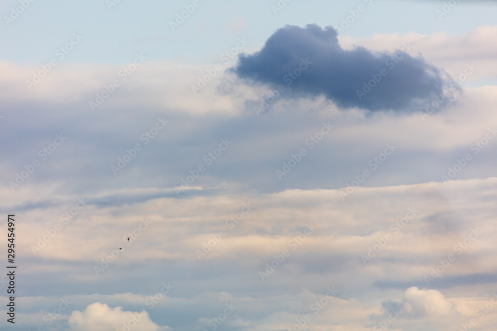 Clouds in the sky at sunset as a background Clouds in the sky at sunset as a background