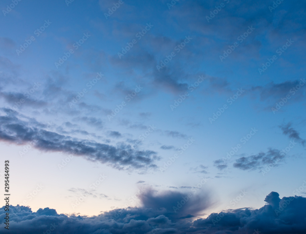 Clouds in the sky at sunset as a background