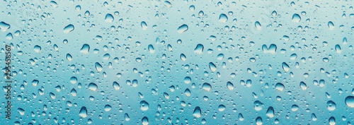 banner for website Water drop on the glass of windows background, raining on the glass off window city for background.