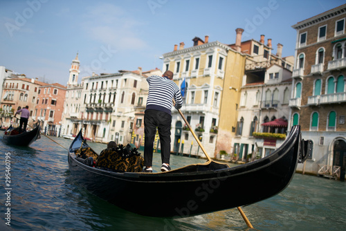 Venice / Italy - September 29th 2019: Gondolier rowing a gondola in Grand Canal © Roberto Vivancos
