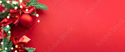 Christmas composition. Background red colors with decorations. Christmas, winter, new year concept. Flat lay, top view, copy space .