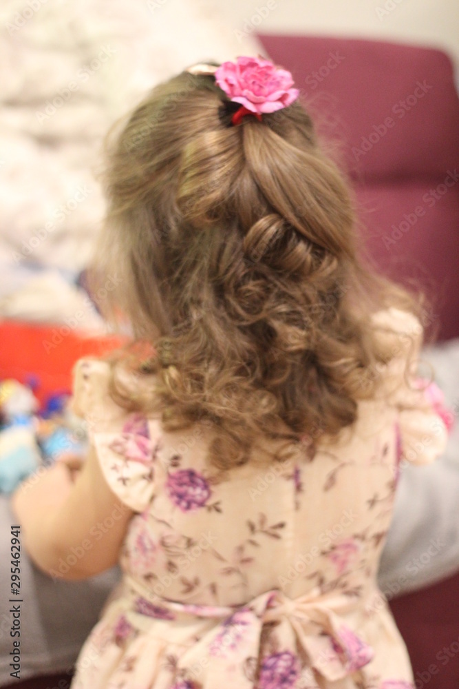 curly beautiful girl received a Christmas present curly beautiful girl received a Christmas present
