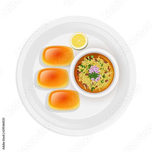 Top view of Maharashtrian dish Misal Pav on plate.