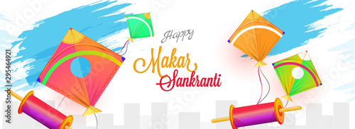 Stylish lettering of Happy Makar Sankranti with colorful kites and spool on abstract background. Website banner or header design.