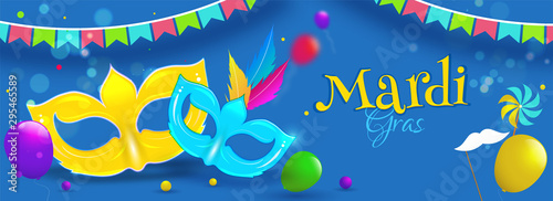 Obraz na plátně Flat style party masks and balloons on blue background for Mardi Gras header or banner design