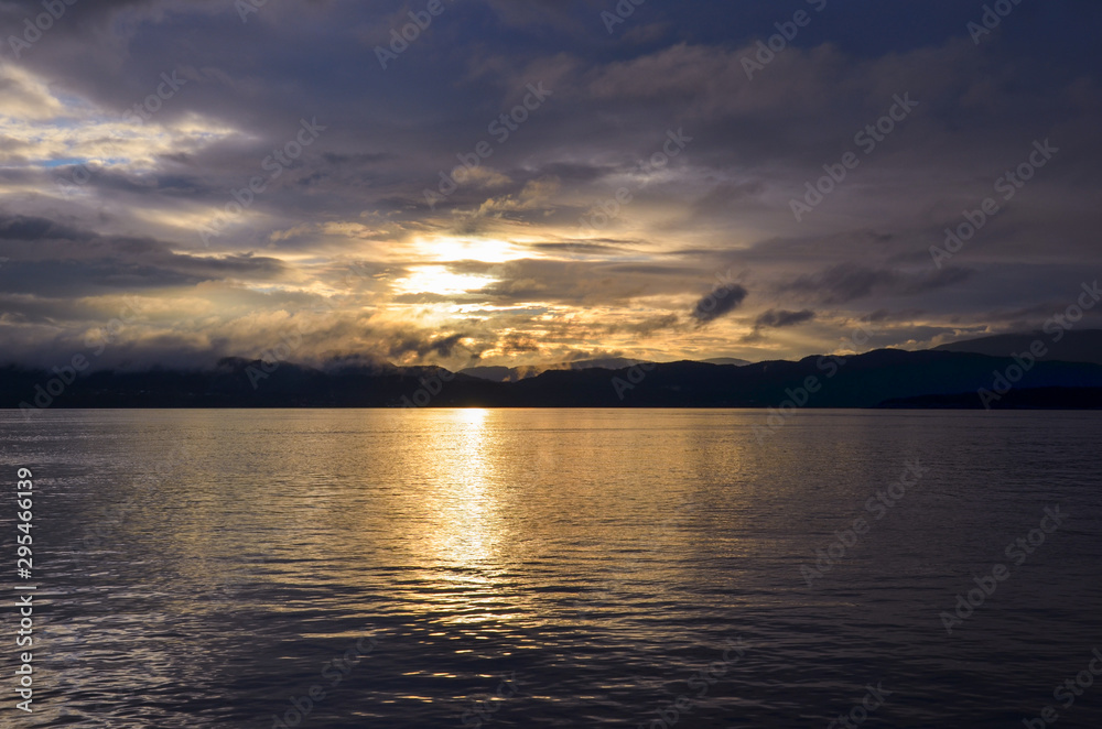 Sunset over a Norwegian archipelago. Seascape.