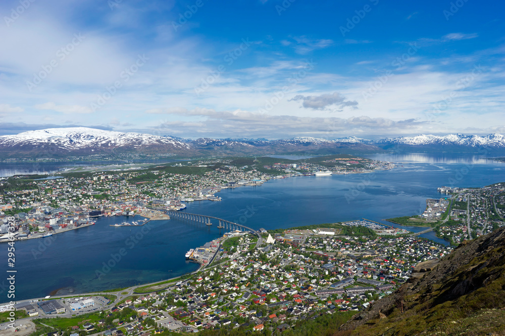 Tromso, Norway with bridge and cruise ship in foreground and airport in background