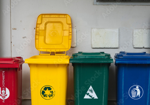 Garbage Trash Bins for collecting a recycle materials. Garbage trash bins for waste segregation. Separate waste collection food waste, plastic, paper and danger waste. Recycling. Environment.