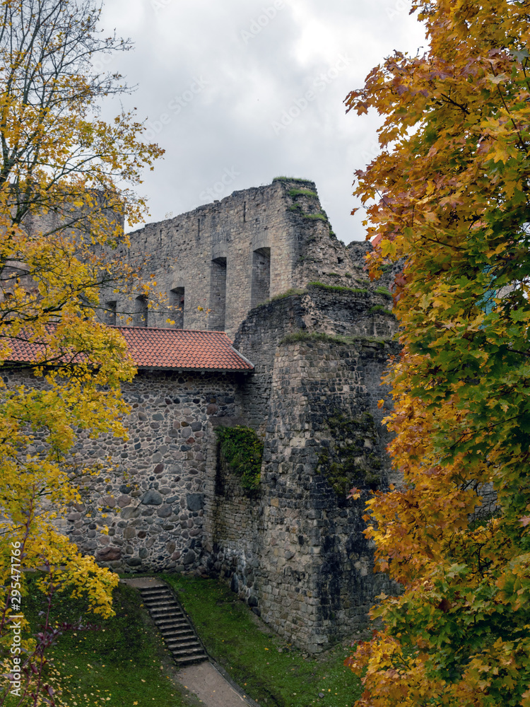 old castle ruins and colorful trees in autumn