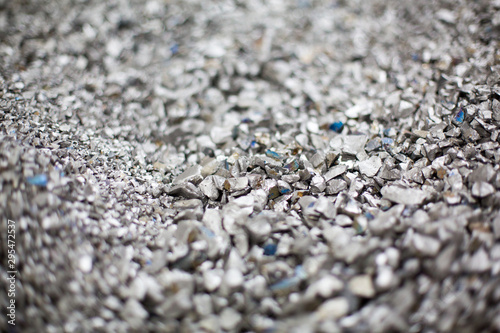 Pieces of ferrotitanium closeup. Ferroalloy used for alloying, deoxidation and degassing of steels and alloys