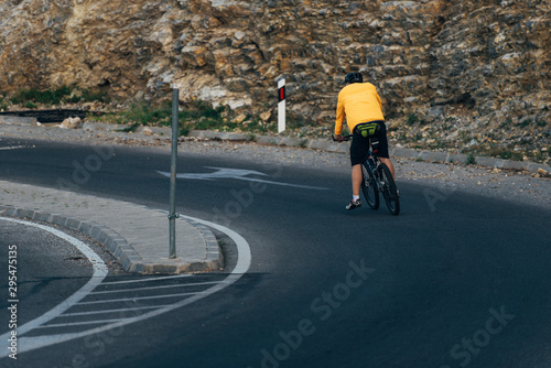 Fototapeta Naklejka Na Ścianę i Meble -  Caucasian man are cycling road bike in the morning