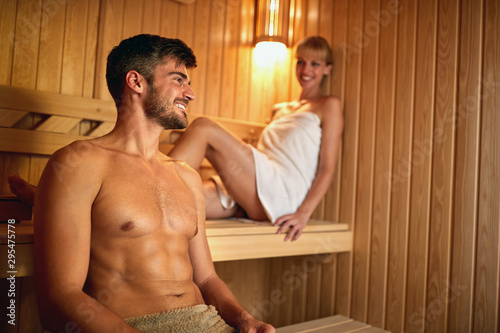 Man and woman in sauna photo