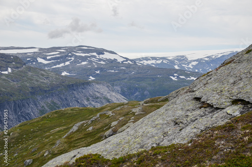 Landscape photo of the trail path to the cliff Trolltunga in the Norwegian mountains. © Jerker