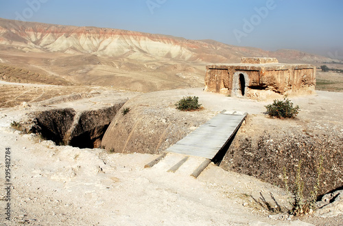 Takht-e Rostam (Takht-e Rustam) is a stupa monastery in northern Afghanistan. The stupa carved from rock surmounted by a harmika. Takht e Rostam is between Mazar i Sharif and Pol e Khomri, Afghanistan photo