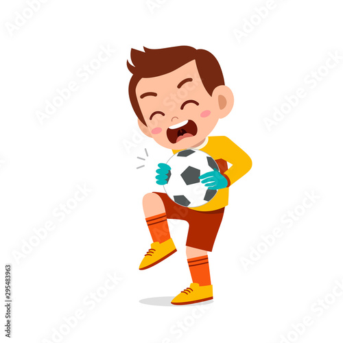 happy kid boy play soccer as goalkeeper
