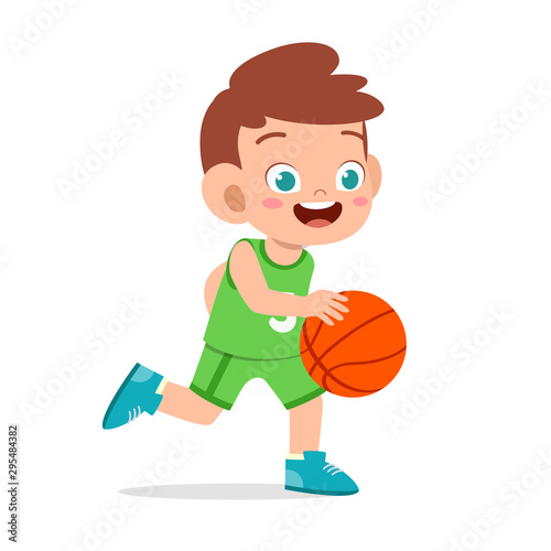 happy cute kid boy play train basketball