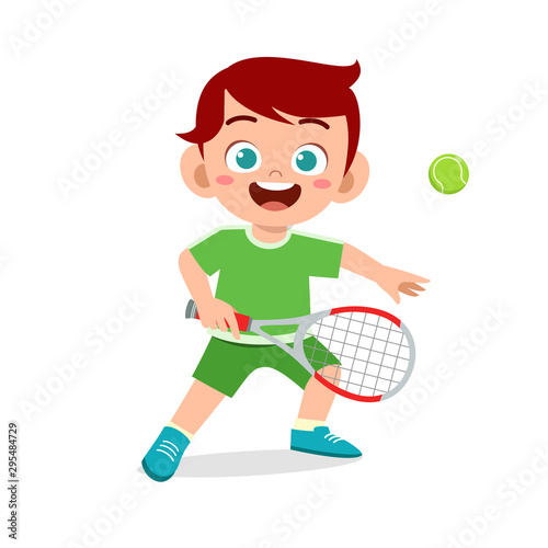 happy cute kid boy play train tennis