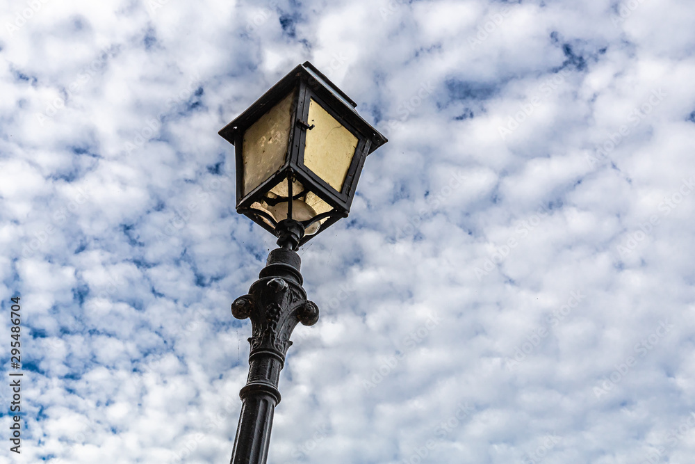 street lamp and clouds