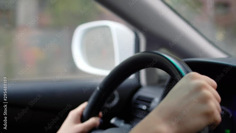 Woman driving car in the city