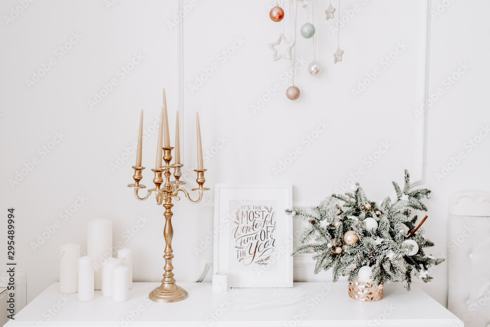 Merry christmas and new year brick wall background. white decor with fir trees and lamps - obrazy, fototapety, plakaty 
