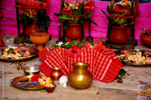 The Hindu Puja materials like earthen pots, mango leaves, flowers, earthen lamps, green coconuts, gamcha (Towel), brass and copper pots, dhunuchi (censer, incensory), etc.