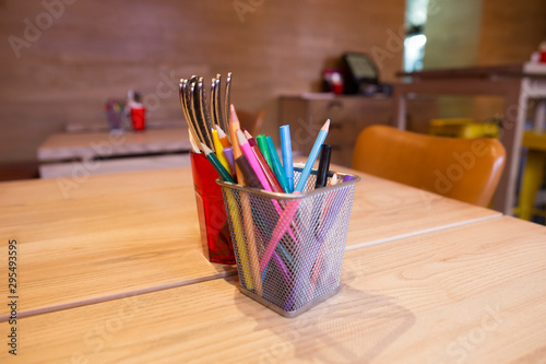 Colorful pencils on table / The decorations on the table
