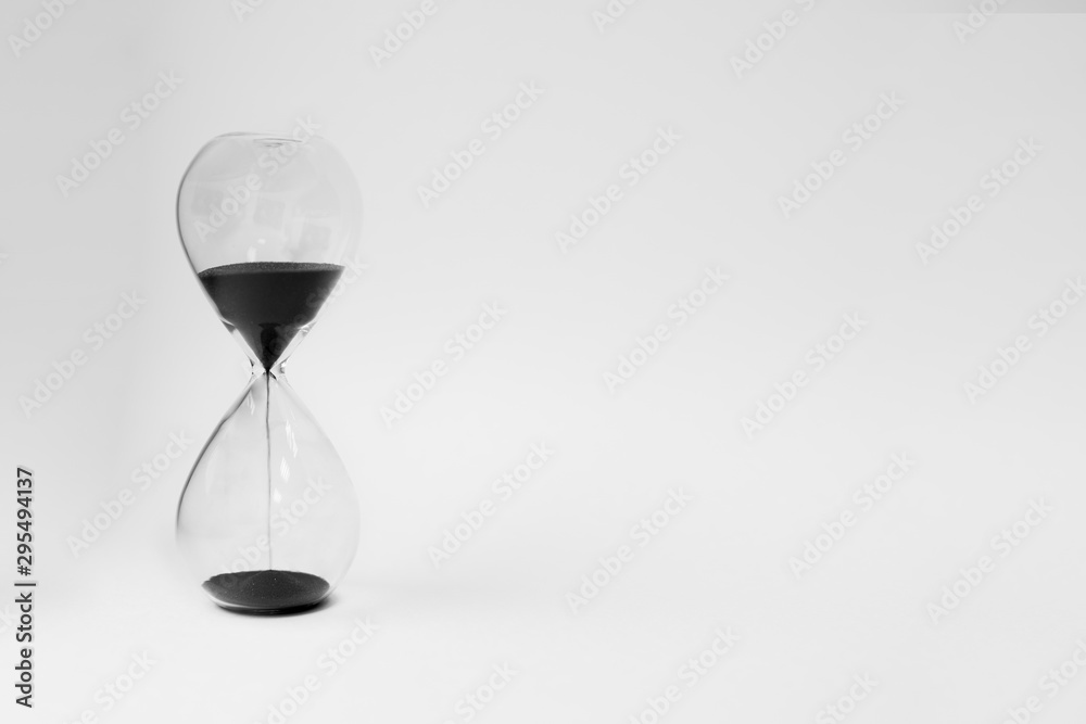 black hourglass on a white background close-up black hourglass on a white background close-up