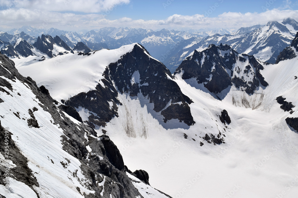 Snowy peaks of Swiss Alps seen from Mount Titlis, Switzerland