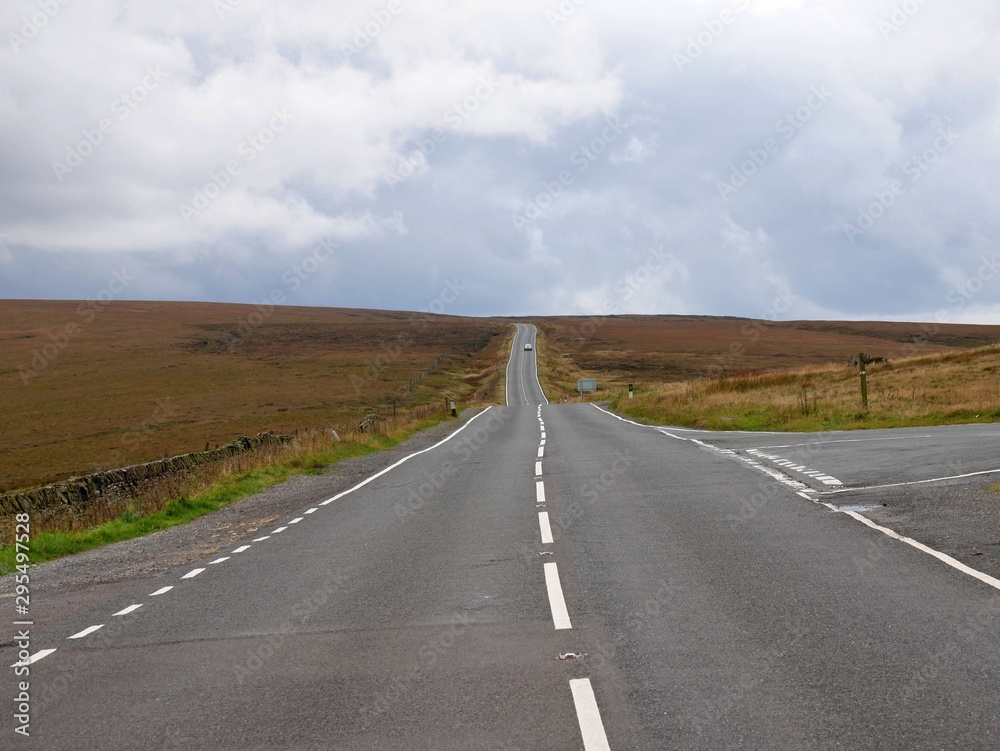Road leeding across the bleak moors from Holmfirth in Yorkshire England to Greenfield in Lancashire England