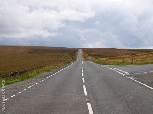 Road leeding across the bleak moors from Holmfirth in Yorkshire England to Greenfield in Lancashire England