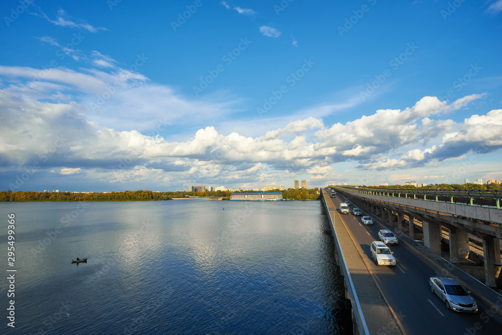 train goes bridge over the Dnieper in Kiev