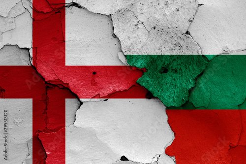 flags of England and Bulgaria painted on cracked wall